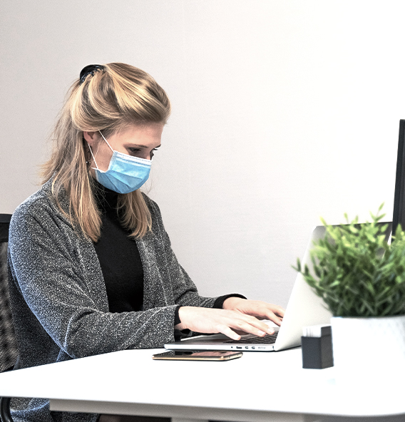 Women typing on laptop