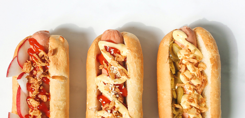 photo of three hot dogs