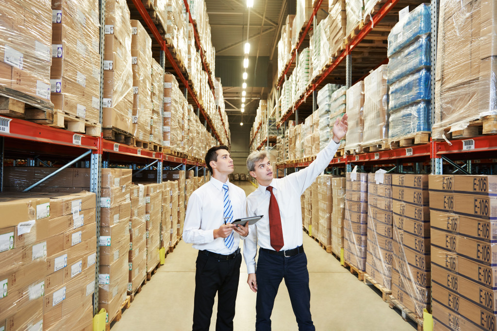 2 guys in a warehouse