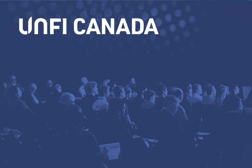 Photograph of a conference gathering with the UNFI Canada logo