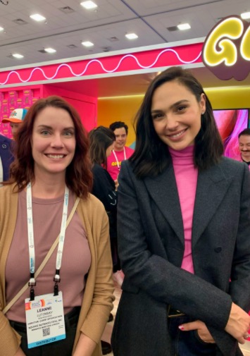 Leanne Lutomsky posing for a photo with Gal Gadot at the Goodles booth on International Women's Day