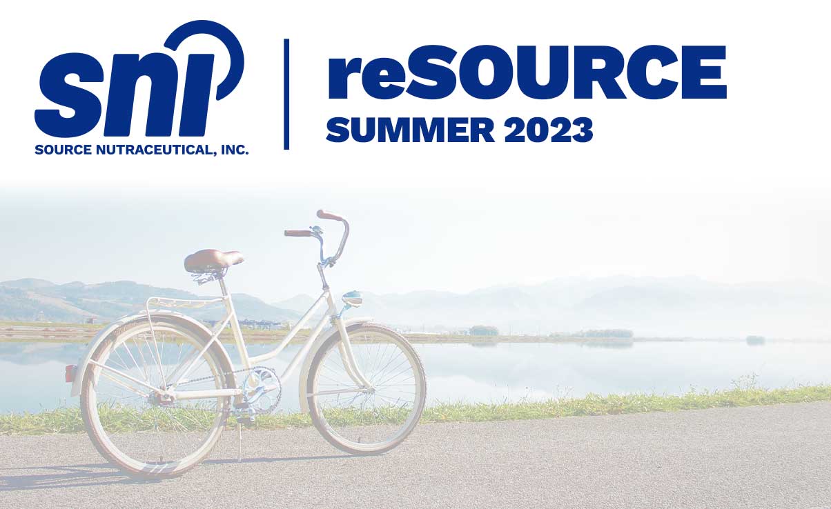 newsletter header with bicycle near the shore Summer 2023