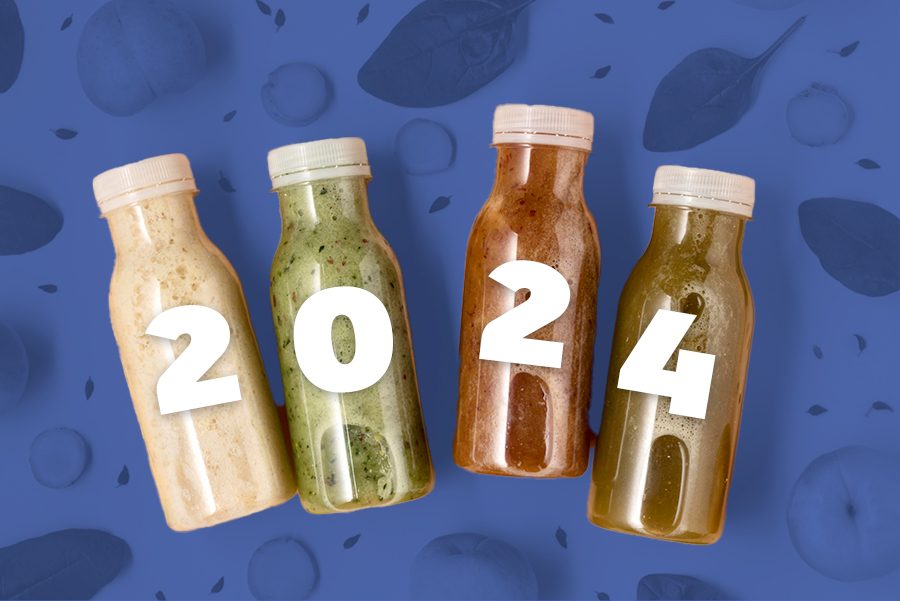 Four different juice bottles with 2024 over top; surrounded by other food ingredients