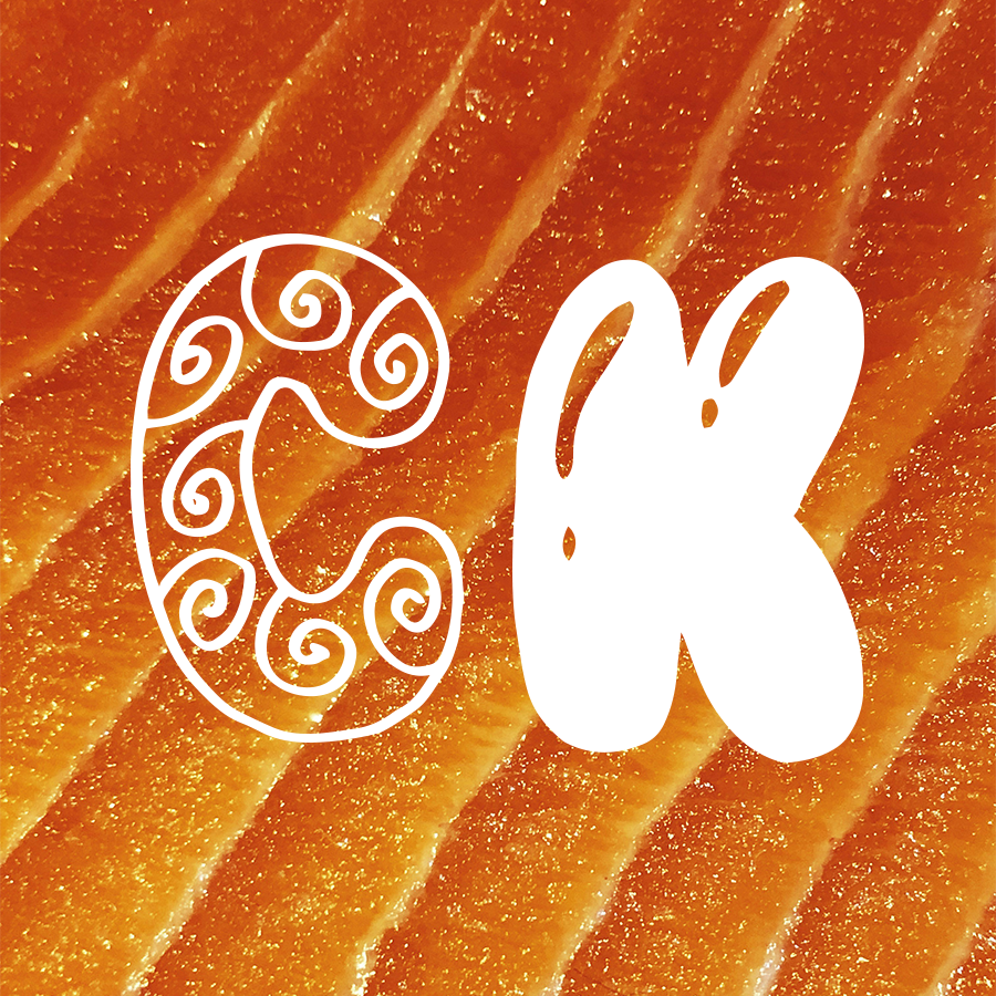 Orange salmon flesh texture with CK initials on top