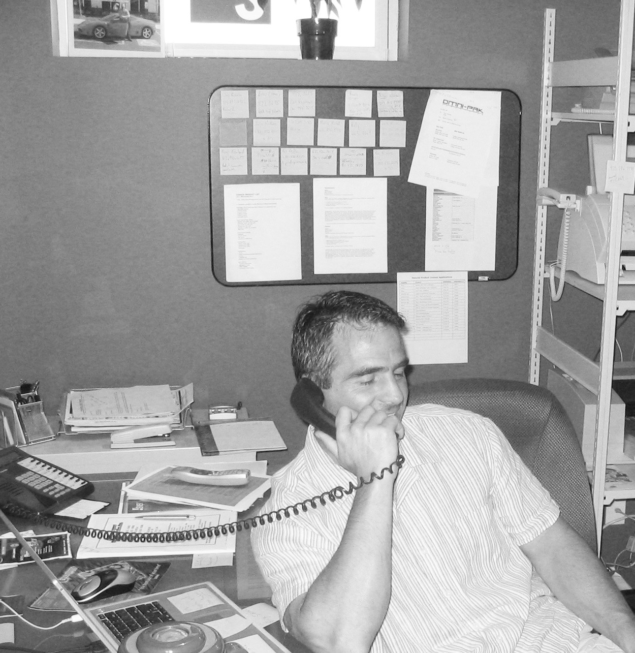 Photograph of Bernie working in his original SNI office